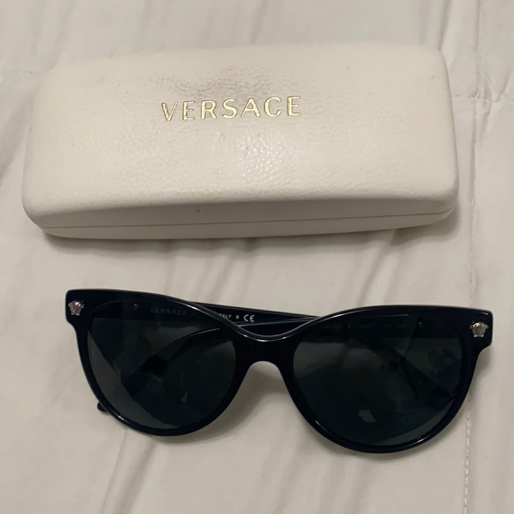 Versace’s black sunglasses